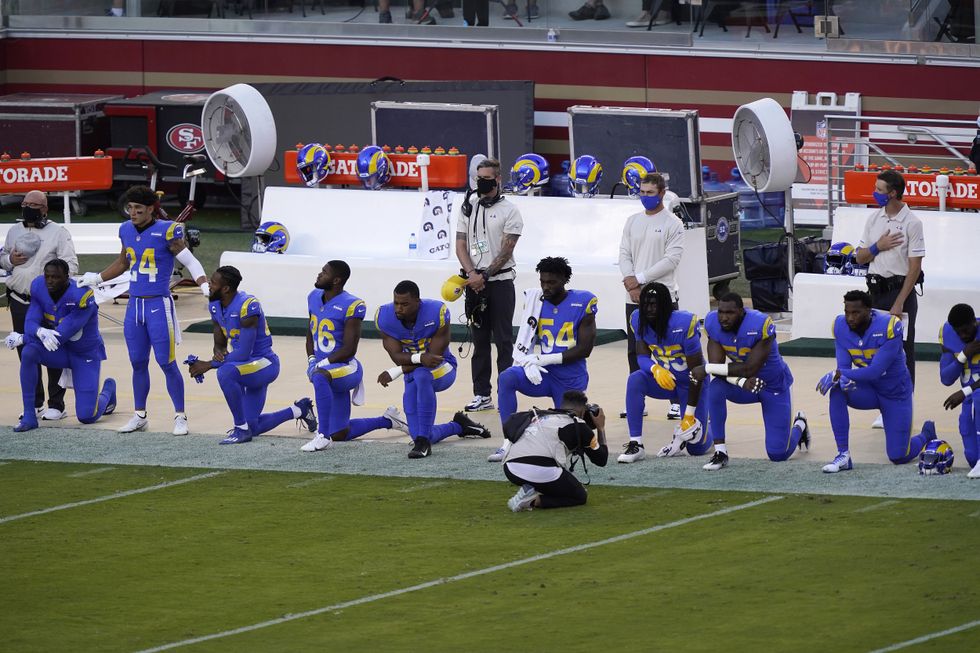 NFL players take the knee