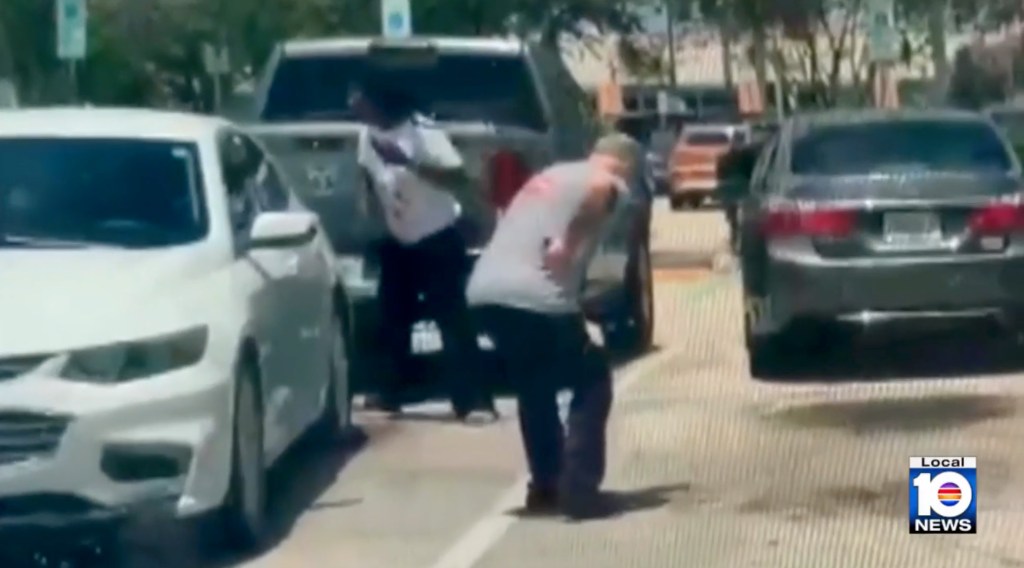 A man bleeding in a Walmart parking lot.