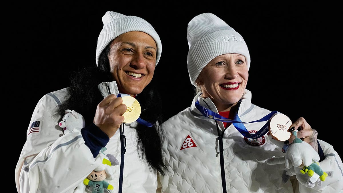 Elana Meyers Taylor and Kaillie Humphries with their medals