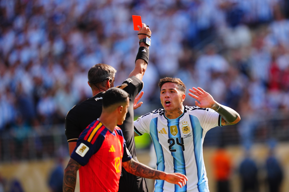 Enzo Fernandez is shown a red card during the World Cup final