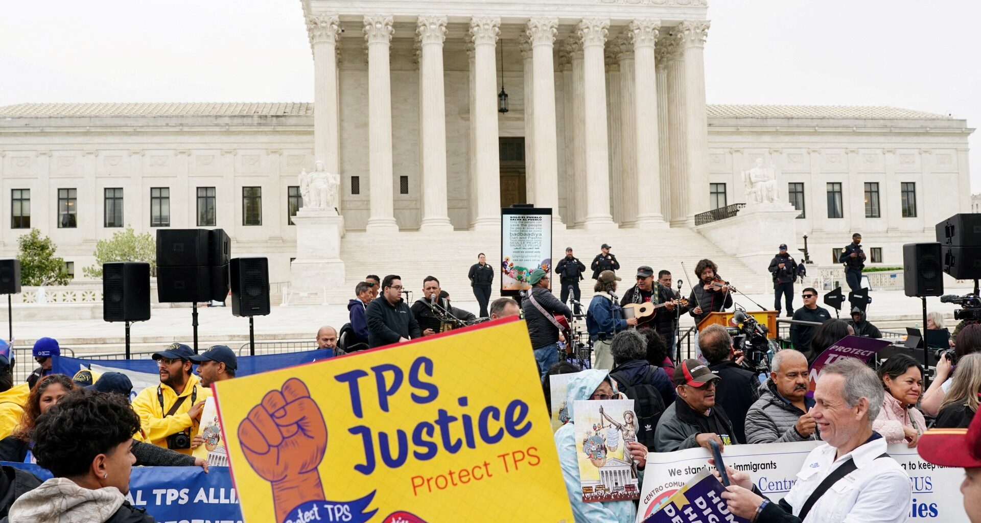 US judge blocks Trump bid to strip work permits from immigrants | Courts News