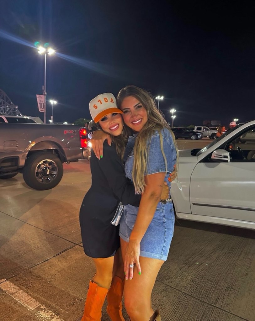 Kelsi Lard (left) and Sara Gilson (Right) embracing.