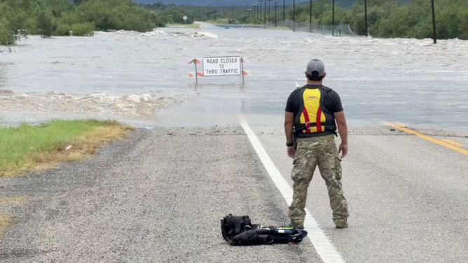 Floodwaters renders road impassable outside Camp Wood, Texas on July 15, 2026.