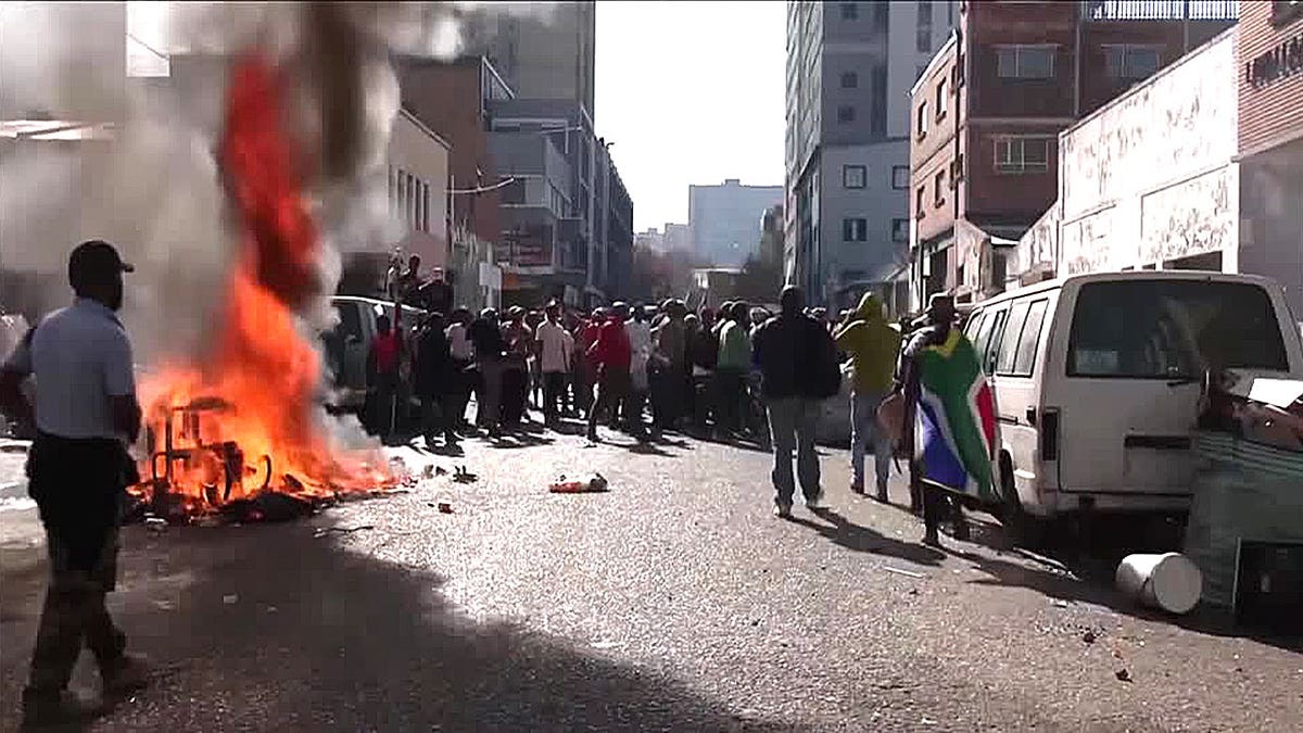 fire in middle of street protest