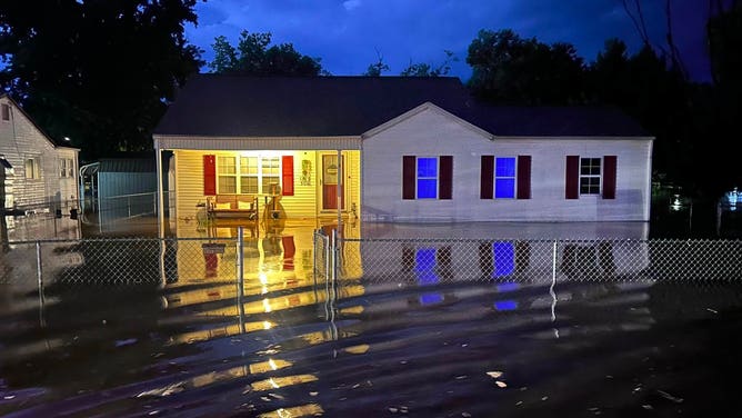 Floodwaters swamp home in Elvins, Missouri on July 10, 2026.