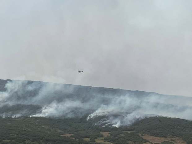 A helicopter flies over the Ferris fire in southwestern Colorado's San Juan National Forest on Tuesday, June 30, 2026. (Photo provided by San Juan Incident Management Team 8)