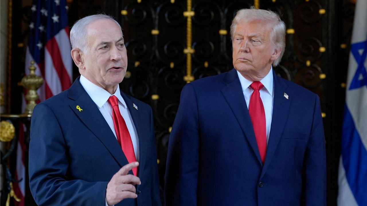 President Donald Trump listens as Israel's Prime Minister Benjamin Netanyahu speaks at President Donald Trump's Mar-a-Lago club, Dec. 29, 2025, in Palm Beach, Fla. (AP Photo/Alex Brandon, File)
