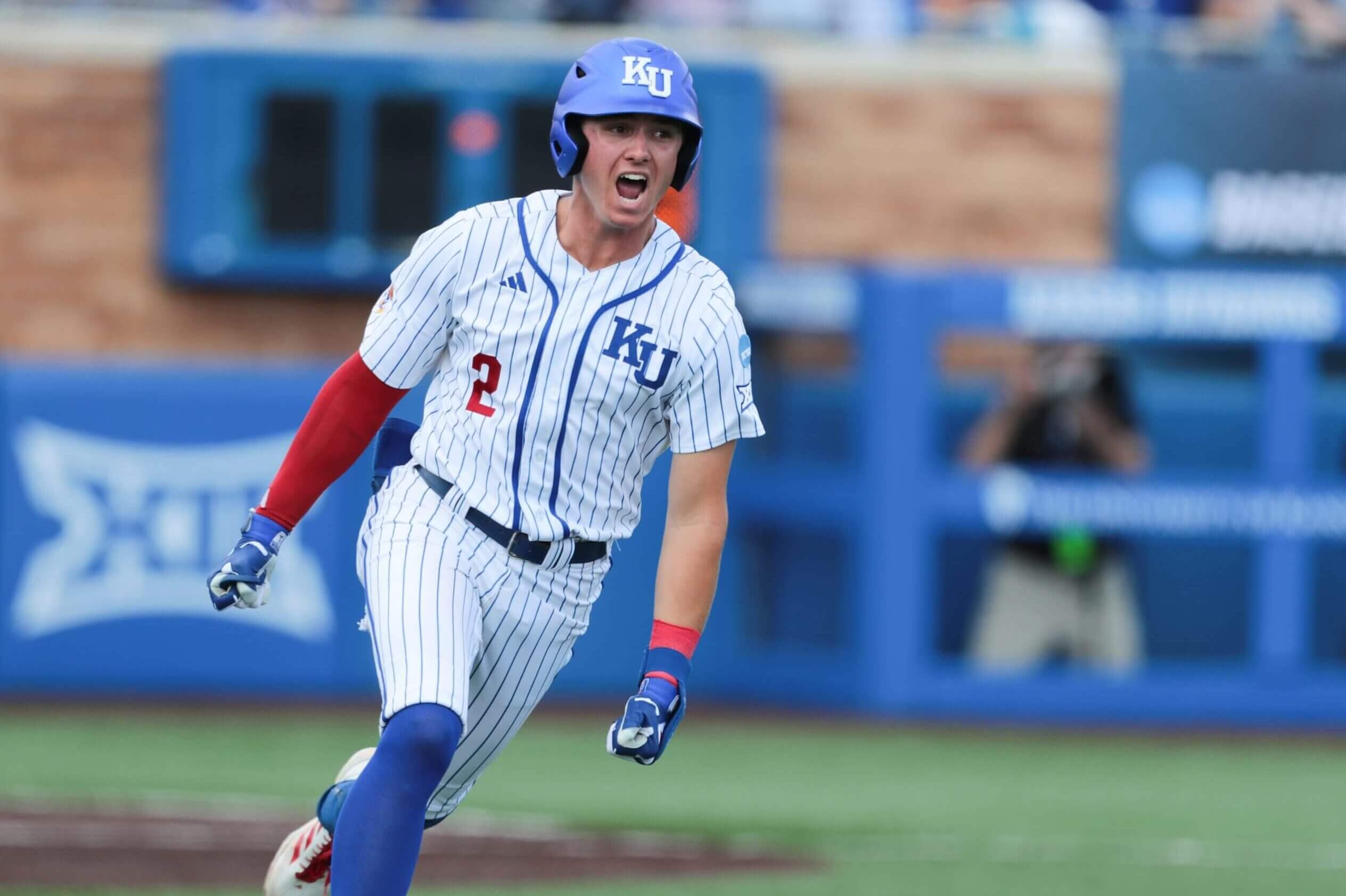Kansas junior Tyson LeBlanc (2) runs to first after a hit against Northeastern during the NCAA First Round of the Lawrence Regional at Hoglund Ballpark on May 29, 2026.
