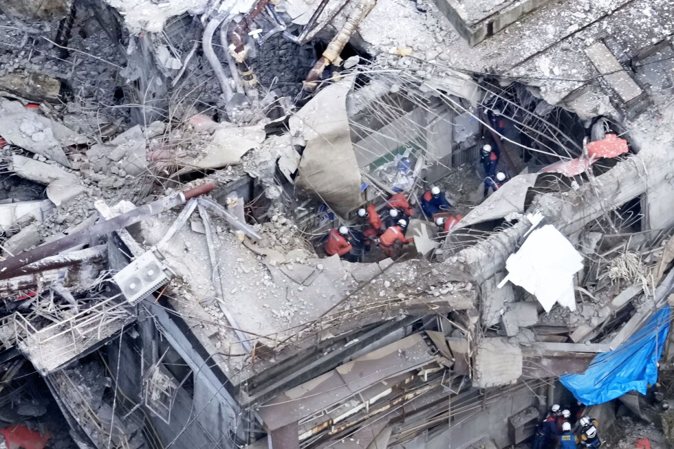 Rescuers search for survivors after a 7.1 quake kills 18 in southwestern Japan