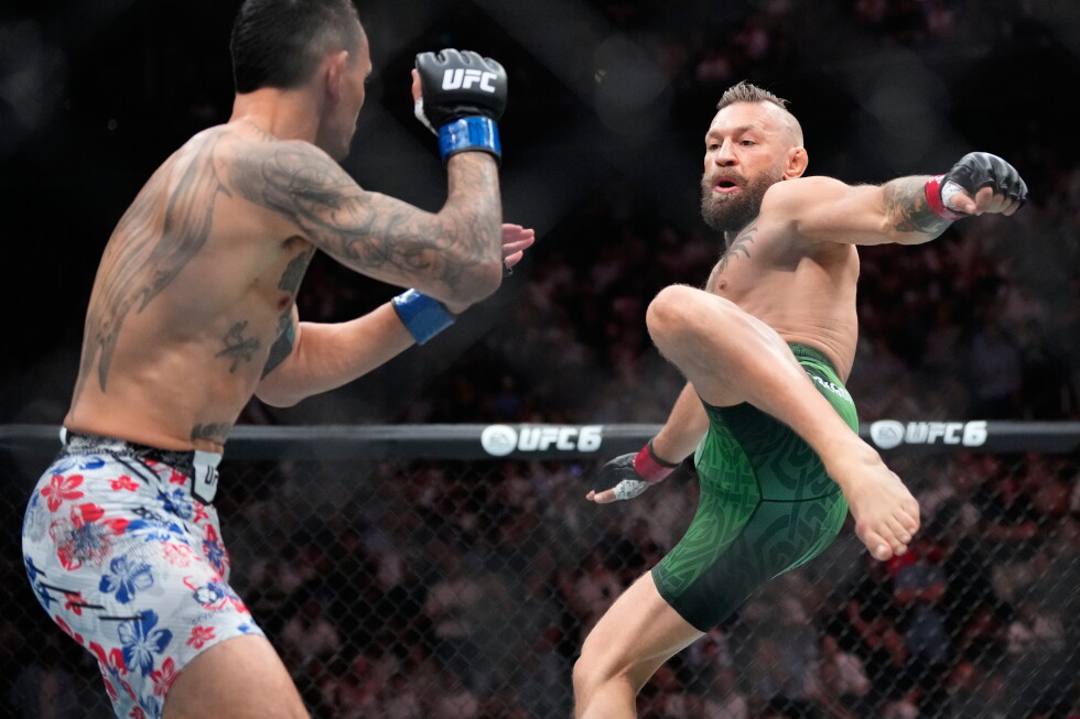 Conor McGregor suffers early knee injury in return, loses to Max Holloway at UFC 329