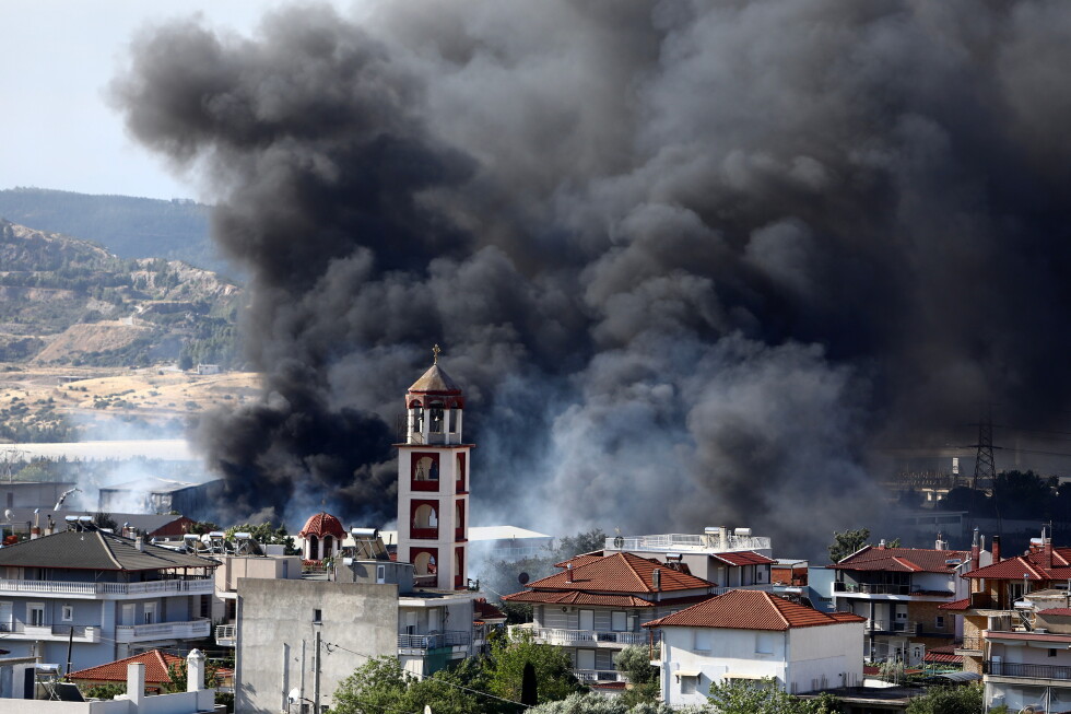 Firefighters battle wildfires in Portugal, Greece and Spain