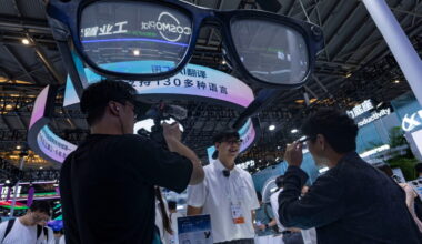 Photos show Chinese companies showcasing AI technology and robots at science forum
