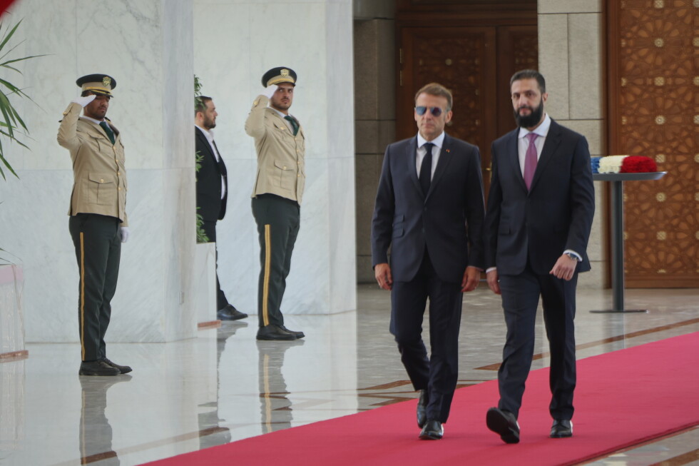 Explosions rock Damascus as France's Macron visits Syria