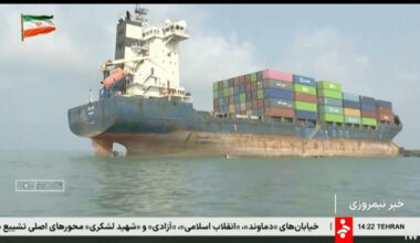 Iran claims a foreign ship got stuck in the Strait of Hormuz but the vessel is tied to Tehran