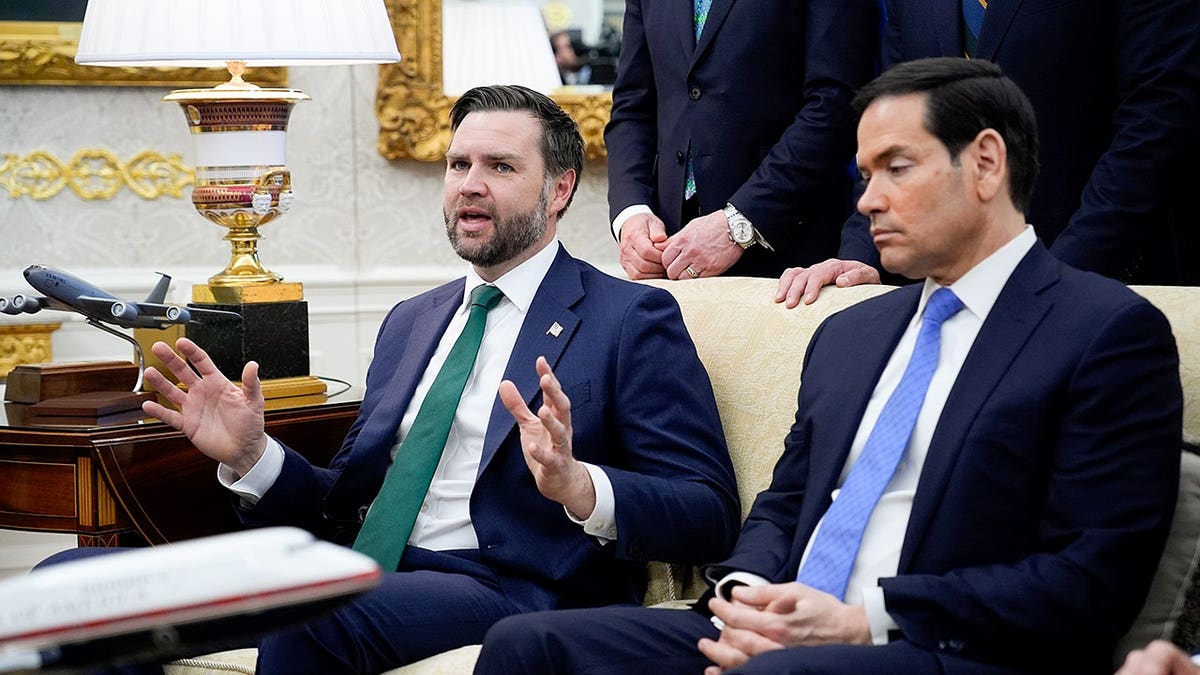 Vance and Rubio on couch in oval office