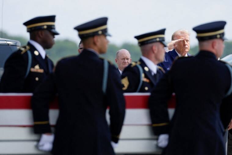REUTERS/EVAN VUCCI
President Donald Trump salutes as members of the military carry the transfer case of U.S. Army Pvt. Isabella Gonzales of the 1st Battalion, 57th Air Defense Artillery Regiment, 52nd Air Defense Artillery Brigade, 10th Army Air Missile Defense Command, who was killed during an attack at Muwaffaq Salti Air Base in Jordan, during a dignified transfer of her remains at Dover Air Force Base in Dover, Del.