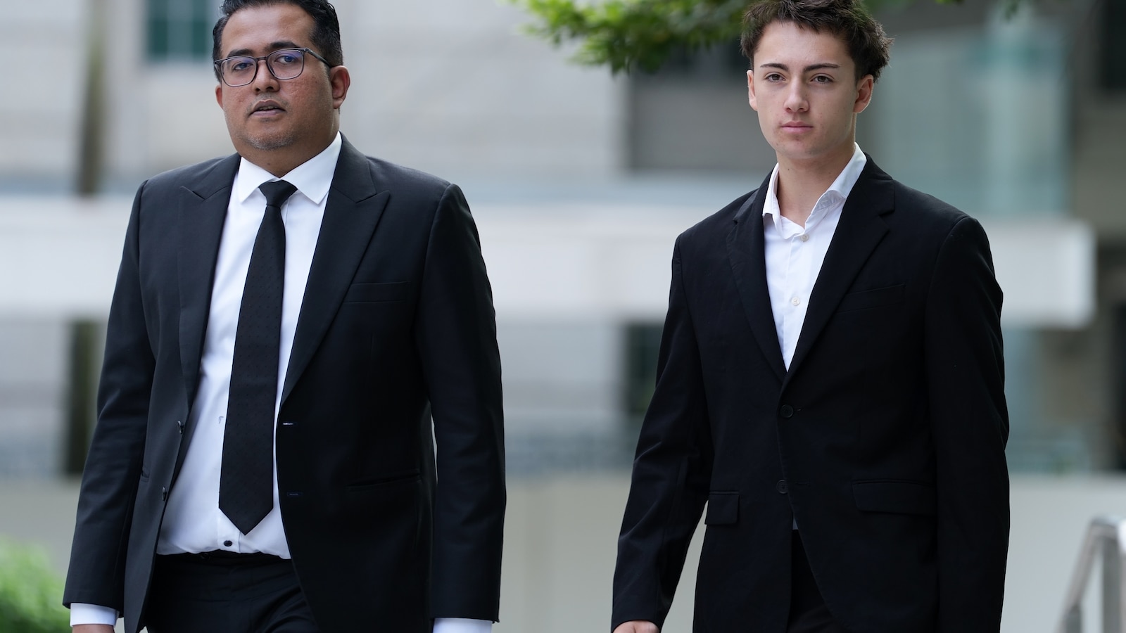 French student pleads guilty and is fined for a straw-licking stunt in Singapore