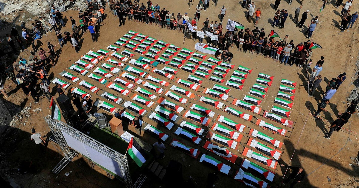 After three years • Mass funeral held in Gaza for 112 people recovered from 2023 strike rubble - Haaretz