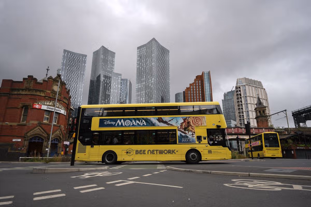A yellow Bee Network bus