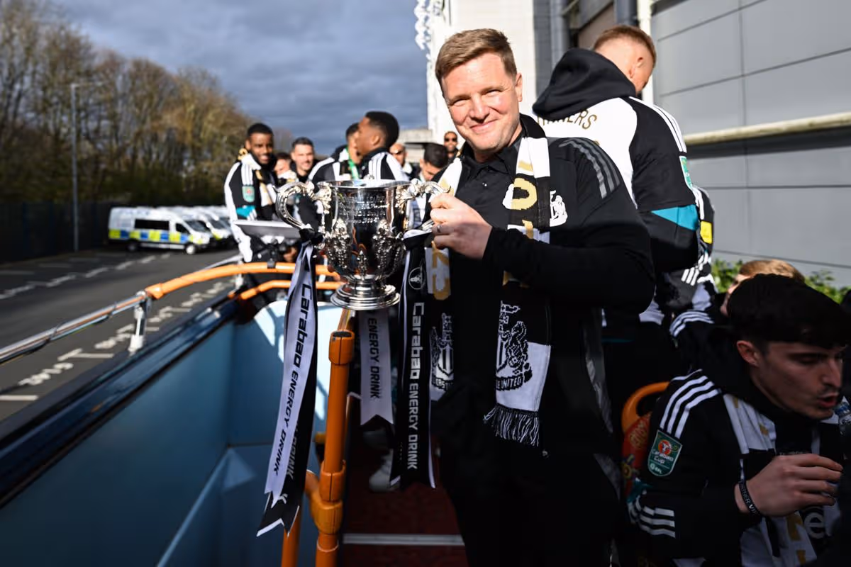 Newcastle United Head Coach Eddie Howe holds the Carabao Cup trophy