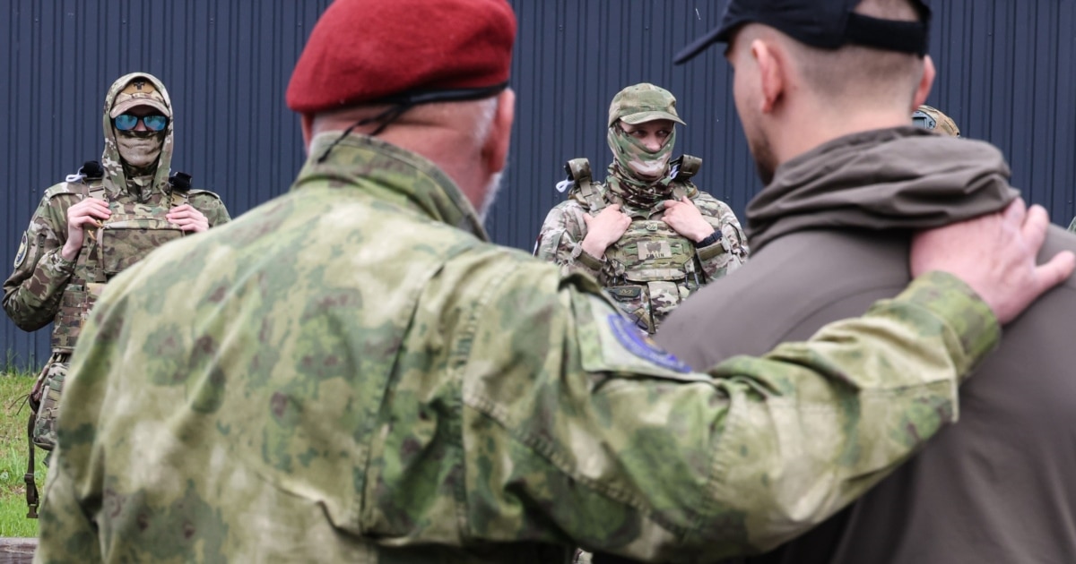 Aggressive Recruiters Are Rounding Up Russians To Fight In Ukraine. In One Town, They're Pushing Back