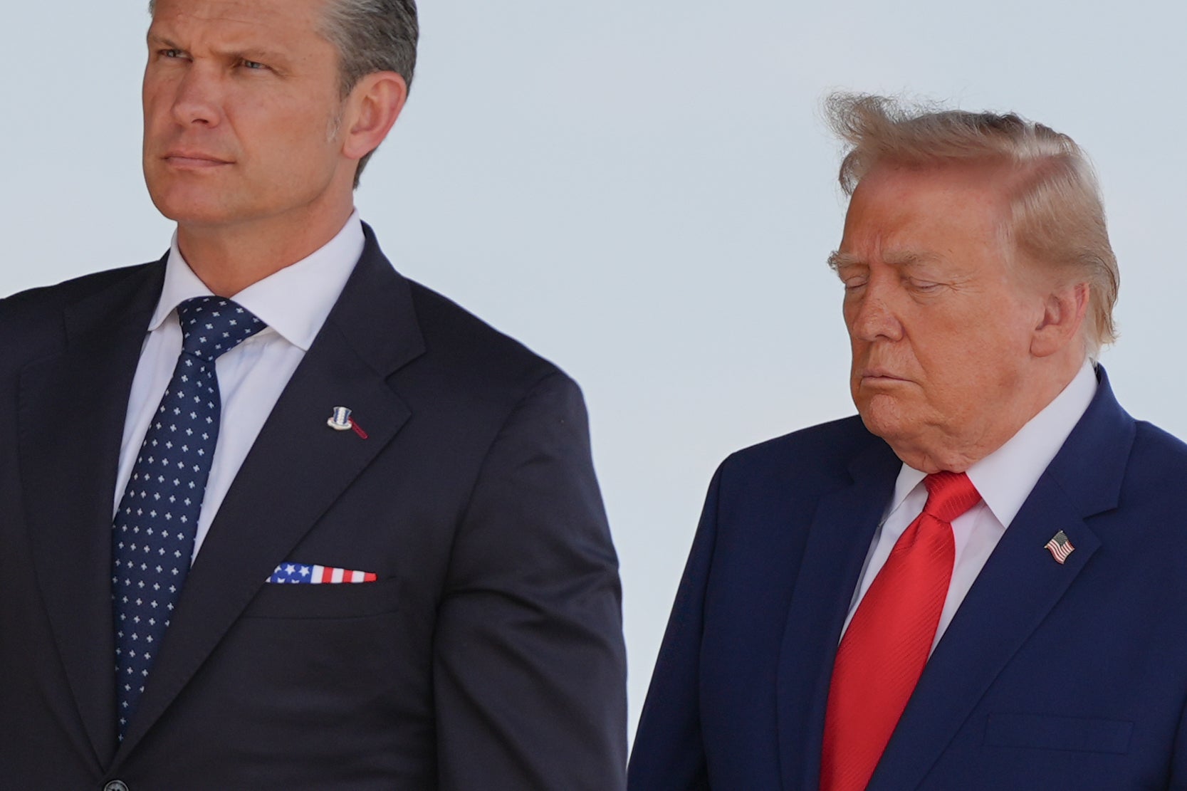 Defense Secretary Pete Hegseth and President Donald Trump attend the dignified transfer of four US service members killed in the Middle East at Dover Air Force Base, Delaware