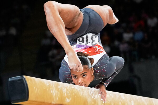 Alia Leat of England competes in the Women's Balance Beam final of Artistic Gymnastics at the Commonwealth Games in Glasgow, Scotland, Tuesday, July 28, 2026. (AP Photo/Manish Swarup)