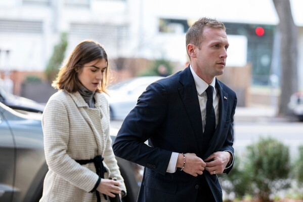 Rep.-elect Max Miller, R-Ohio, arrives for new member orientation check-in and program registration with Emily Moreno in Washington, Nov. 13, 2022. (AP Photo/Amanda Andrade-Rhoades, File)