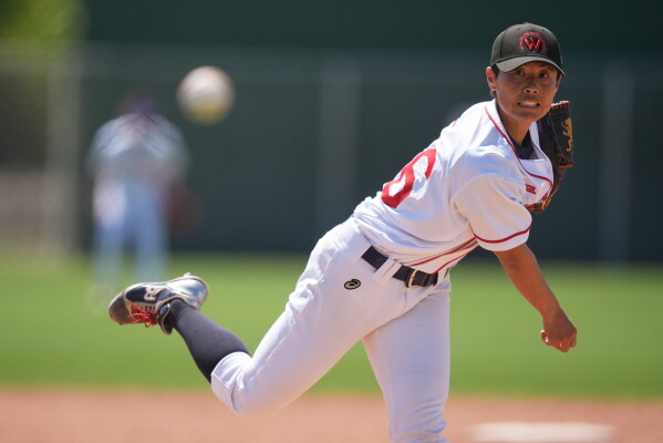Ayami Sato pitches during a Women's Pro Baseball League exhibition game, Thursday, March 19, 2026, in Fort Myers, Fla. (AP Photo/Rebecca Blackwell, File)