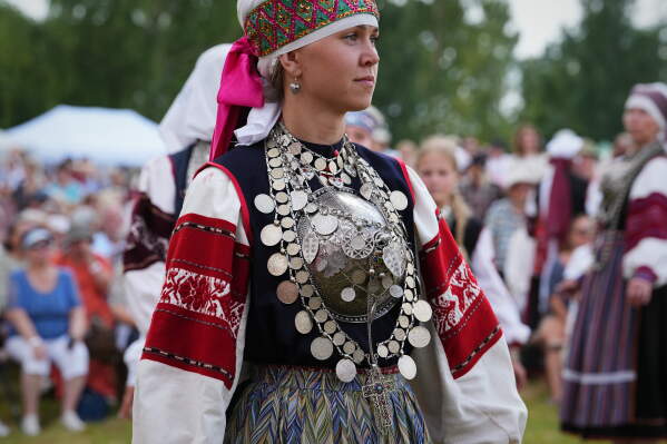 Estonia Seto Kingdom Day Women wearing traditional Seto costumes dance during the annual Seto Kingdom Day in Mikitamäe, south Estonia, Saturday, Aug. 1, 2026. (AP Photo/Sergei Grits)