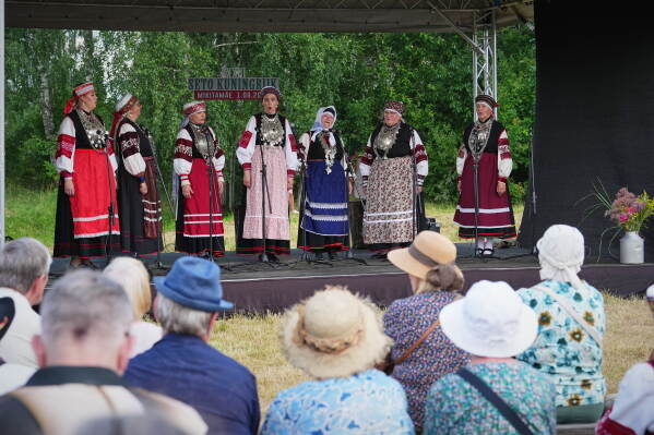 Estonia Seto Kingdom Day Women wearing traditional Seto costumes sing during the annual Seto Kingdom Day in Mikitamäe, south Estonia, Saturday, Aug. 1, 2026. (AP Photo/Sergei Grits)