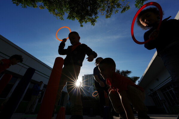 Children play during aftercare for the Head Start program at Easterseals South Florida, in Miami, Jan. 29, 2025. (AP Photo/Rebecca Blackwell, File)