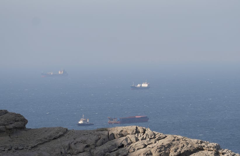 Ships and tankers in the Strait of Hormuz off the coast of Musandam, Oman, April 18, 2026.