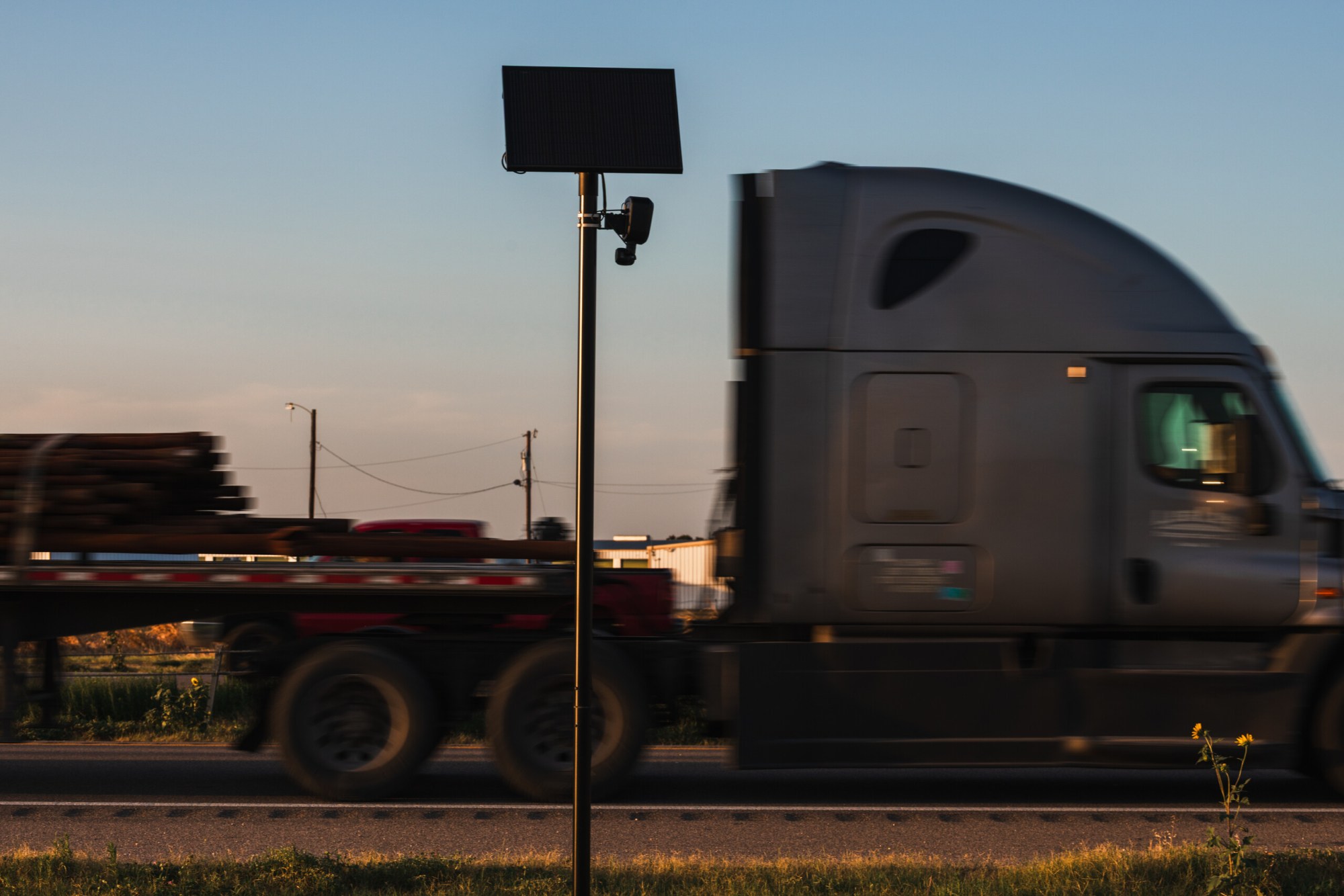 A Flock automatic license plate reader (ALPR) operated by Texas Department of Public Safety (DPS) records vehicles that drive past on State Highway 6 in Speegleville, Texas on Tuesday, July 28, 2026.