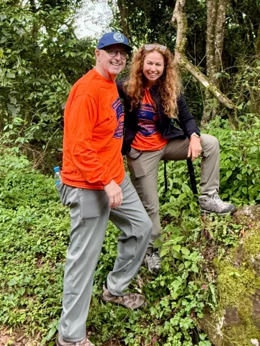 Pamela Becker, founder and CEO of Jeremy’s Circle, and Jamie Lassner, executive director of Accessibility Accelerator, at Marangu Gate ahead of the team’s ascent of Mount Kilimanjaro, July 2026. Credit: Accessibility Accelerator.