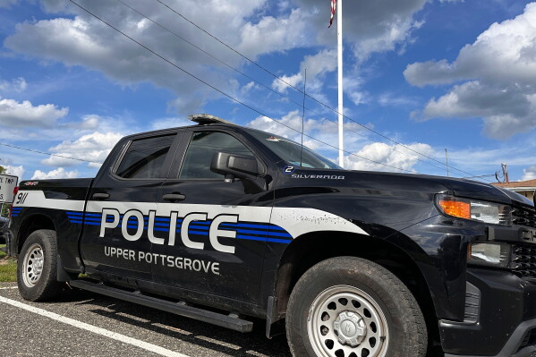 An Upper Pottsgrove Township police vehicle is seen Wednesday, Aug. 26, 2026, in Upper Pottsgrove Township, Pa. (AP Photo/Tassanee Vejpongsa)