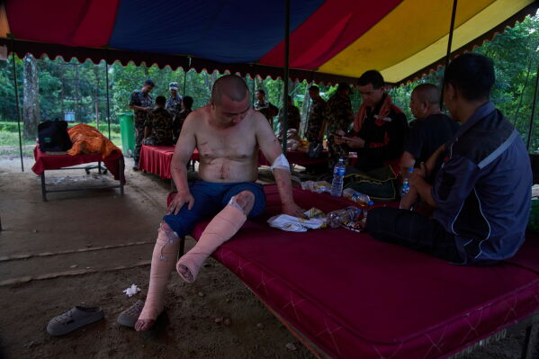 A survived Chinese citizen receive treatment at the army's Maithali barracks after being rescued from flash flooding in Nuwakot district, Nepal, Thursday, Aug. 27, 2026. (AP Photo/Niranjan Shrestha)
