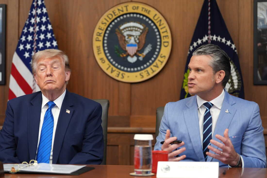 Defense Secretary Pete Hegseth speaks alongside President Donald Trump during a cabinet meeting, Friday, July 31, 2026, at Camp David, the presidential retreat, near Thurmont, Md., Friday, July 31, 2026.