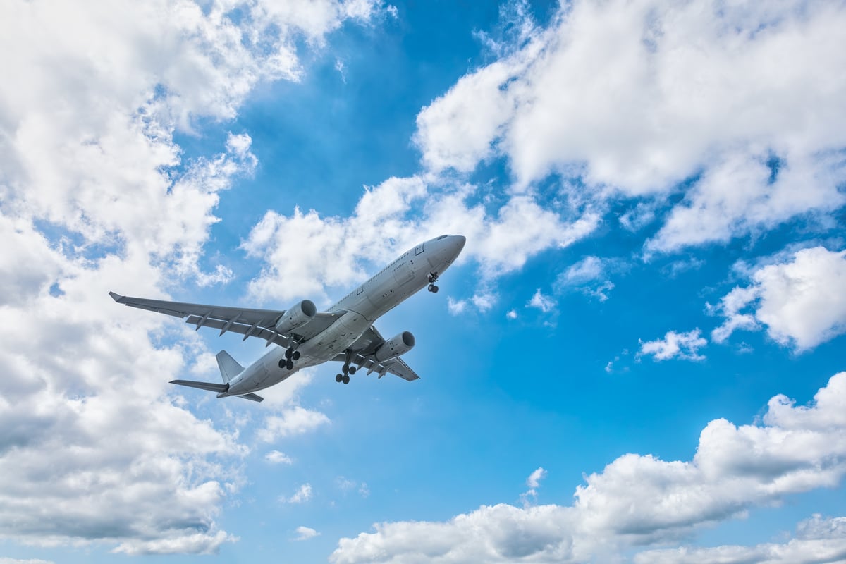 A commercial aircraft in the sky.
