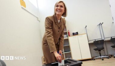 Iceland's Prime Minister Kristrun Frostadottir votes in the national referendum on resuming EU membership talks, at a polling station in Reykjavik