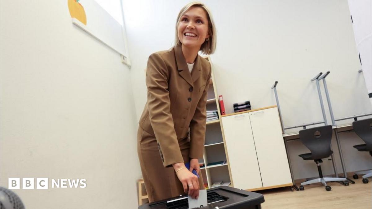 Iceland's Prime Minister Kristrun Frostadottir votes in the national referendum on resuming EU membership talks, at a polling station in Reykjavik