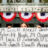 Olivia Konar holds a banner with names of young people who advocates say died as a result of social media outside the Ronald V. Dellums Federal Building and U.S. Courthouse on Tuesday, Aug. 18, 2026, in Oakland, Calif. Her sister Coco Konar died in 2022 when she was 17. Social media company Meta agreed to a nearly $17 billion settlement with a group of states over its child safety practices.