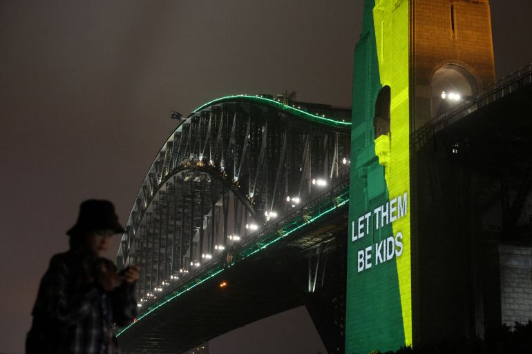 A message that reads ‘Let them be kids’ is projected onto the Sydney Harbour Bridge to mark a law banning social media for users under 16 in Australia in Sydney, Australia, December 10, 2025