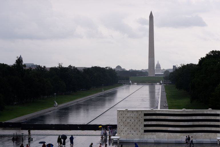 Rain falls on the now-drained Lincoln Memorial Reflecting Pool in Washington, DC, the US on August 2, 2026