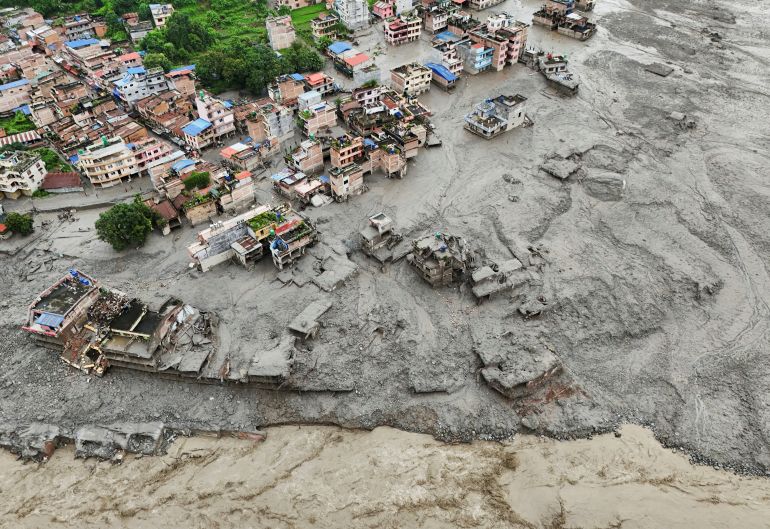 Dozens of bridges have been destroyed and nearly 40 kilometres (25 miles) of roads damaged, complicating search efforts, Nepali officials say