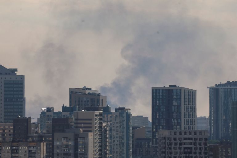 Smoke rises in the city during a Russian drone strike, amid Russia's attack on Ukraine, in Kyiv, Ukraine, August 28, 2026. REUTERS/Gleb Garanich