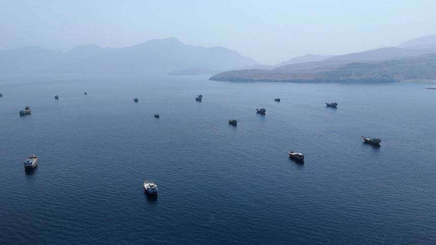 A drone view shows vessels near the Strait of Hormuz, as seen from Musandam, Oman, August 28, 2026.