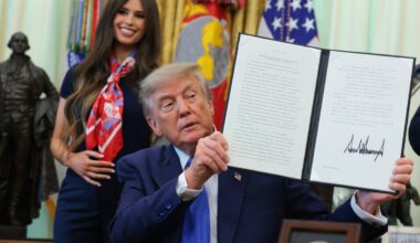 ‘Bobble head’ woman behind Trump during vaccine announcement becomes internet’s newest obsession