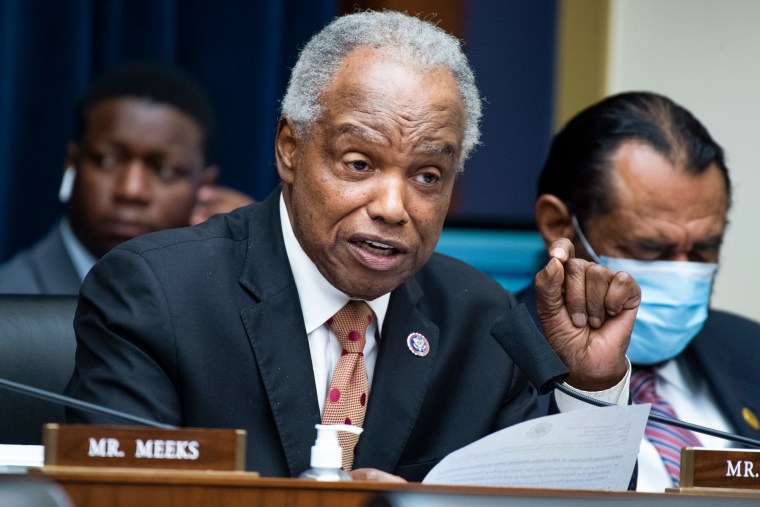 David Scott speaks while seated during a hearing