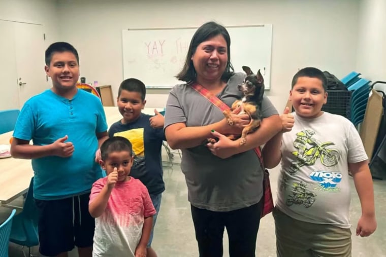 Vanessa Antonino is reunited with her chihuaha, Flor. 